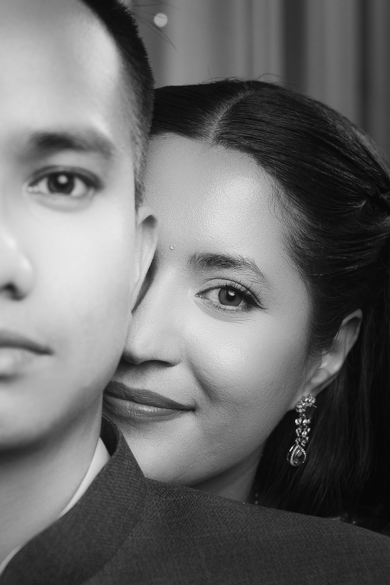 Black and white fine art portrait of newlywed couple