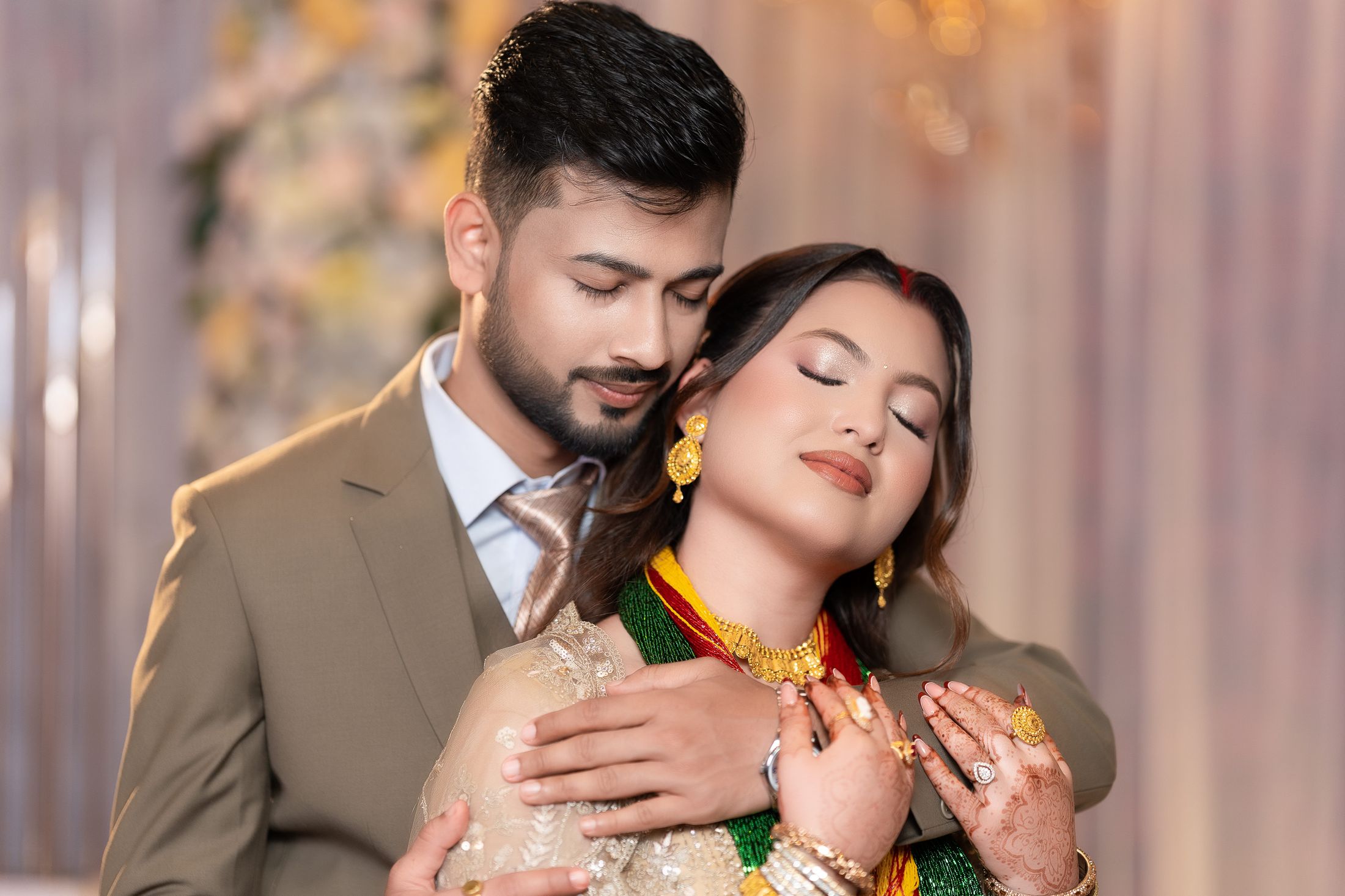 Prashid resting his head against Inusha's with eyes closed in a tender embrace
